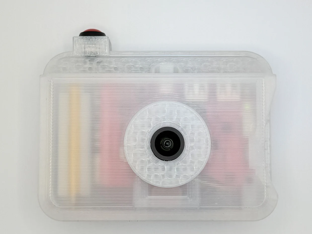 Roc Camera — a translucent 3D-printed camera body with a central lens